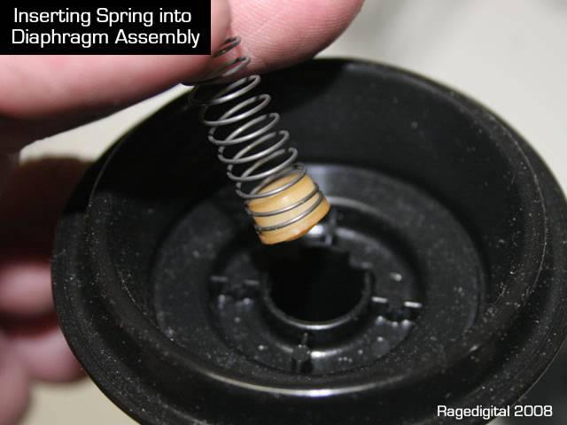 fzr600_inserting_spring_into_diaphragm_assembly.jpg fzr600_inserting_spring_into_diaphragm_assembly.jpg