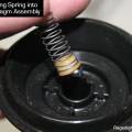 fzr600_inserting_spring_into_diaphragm_assembly.jpg